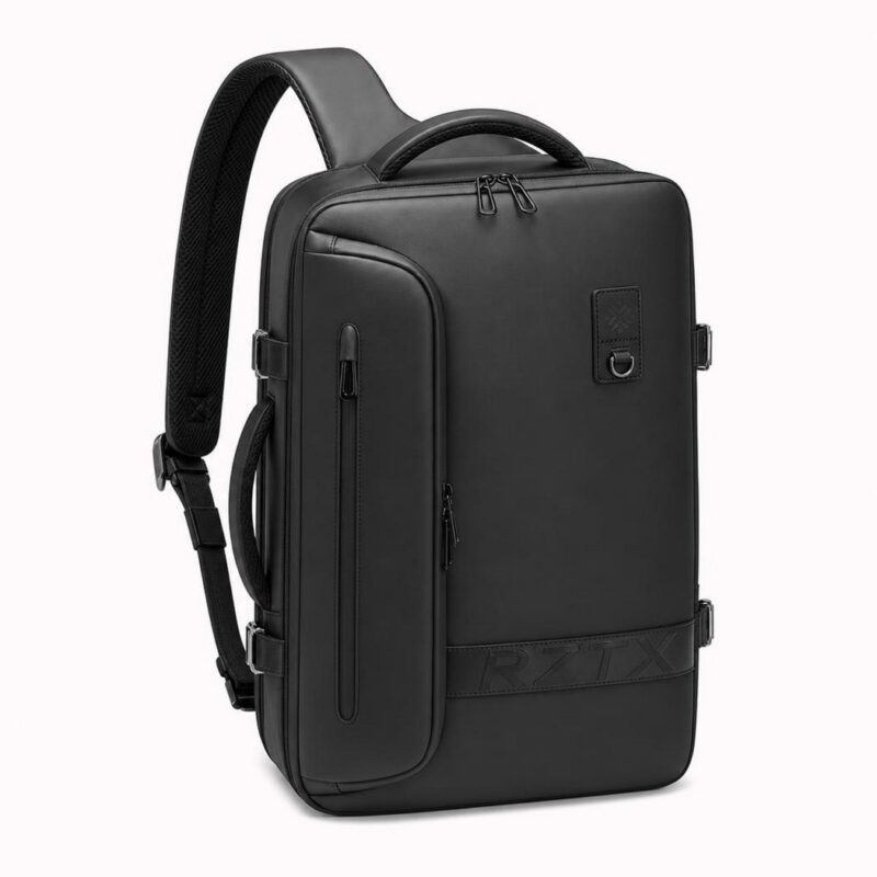 IMG_06_25_sac_dos_voyage_homme_extensible_pompe_incluse_1.jpg Un sac à dos voyage homme extensible avec pompe incluse noir, avec une grande poche zippée, une poignée en haut et des bretelles rembourrées, sur fond blanc.