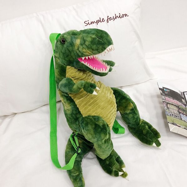 Originele 3D Groene Dinosaurus Rugzak In Een Wit Bed